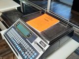 a laptop computer sitting on top of a desk