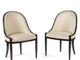 paire de chaises de salle à manger de style Art déco, recouvertes d'un tissu à imprimé léopard