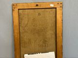 an old wooden frame with a piece of paper in it