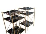 three tiered glass and brass shelf unit with black marble top