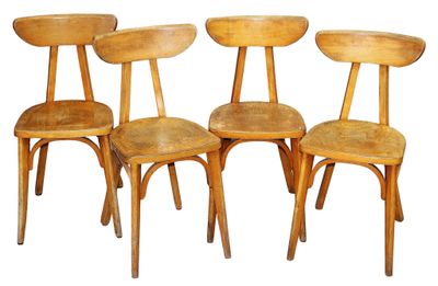 four wooden chairs are lined up against a white background