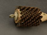 a close up of a brush on a table