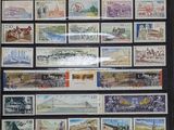 an image of a picture of a collection of stamps on a wall