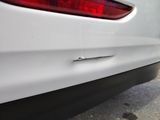 a close up of a car ' s tail light and tail light