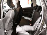 a car that has two seats in the back of it