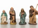 five figurines of jesus and other religious figures
