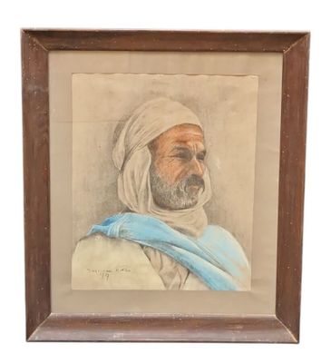 an old picture of a man with a blue scarf in a wooden frame