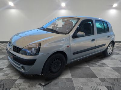 a picture of a silver car parked in a garage