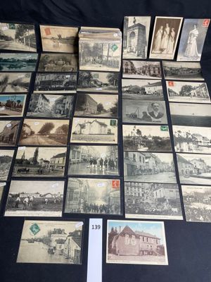 a bunch of old postcards are sitting on a table