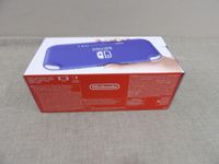 Console de jeux Nintendo Switch Lite - coloris Bleu - NEUF (photo 2)