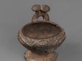 an image of a small bowl with a bird on it