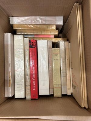 a box full of books that are sitting on a table