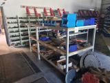 many tools on the shelves in the garage