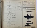 an open book with a drawing of a plane on it