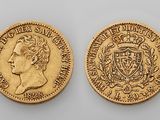 two gold sovereigns, one of which is a sovereign and the other of which is a sovereign