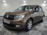 the brown dacia is parked in a room with a checkered floor