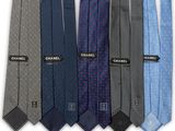 a close up of a row of ties with different colors
