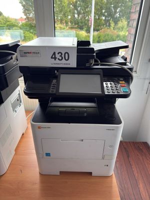a printer that is sitting on top of a table