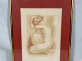dessin représentant une femme nue assise à genoux, dans un cadre doré
