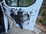 a door of a car that has a speaker in it
