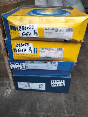 three boxes stacked on top of each other on the floor