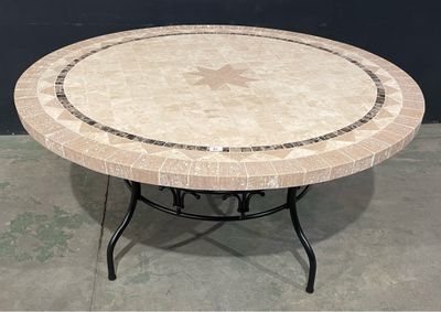 a marble table with a star design on the top