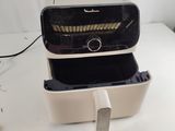 a toaster and a toaster sitting on a table