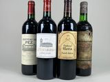 trois bouteilles de vin sont alignées sur une surface blanche