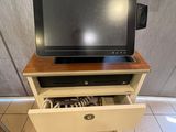 a television that is sitting on top of a cabinet