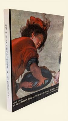un livre sur lequel figure la photo d'une femme en robe rouge