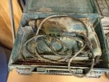 a suitcase that has a bunch of wires in it