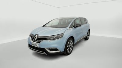 a blue car is parked in a white room with a white floor
