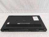 the back of a laptop computer sitting on top of a white surface