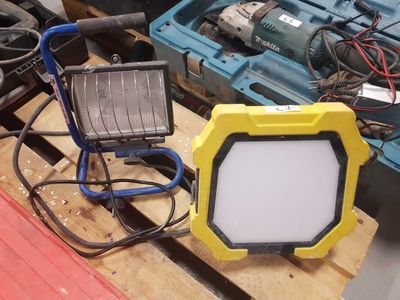 a yellow light that is sitting on a pallet