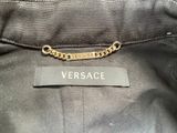 a close up of a label on a black jacket