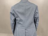 the back view of a blue jacket on a mannequin mannequin mannequin mannequin mannequin mannequin mannequin manne