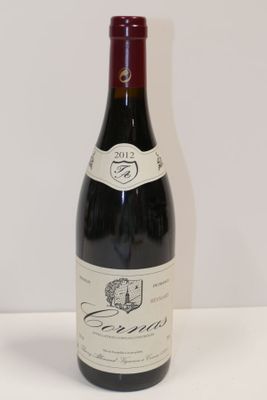 a bottle of wine that is sitting on a table