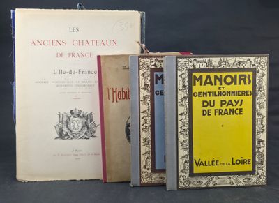 three books are stacked on top of each other on a table