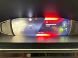 a digital display on the dashboard of a car