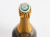 a close up of a bottle of champagne on a white background