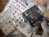 a pile of jewelry on a table in a room