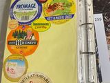a binder with a lot of stickers on it