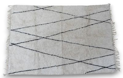 a close up of a white rug with black lines on it
