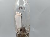 an old fashioned lamp that has been turned into a lamp