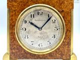 a clock that is sitting on top of a table