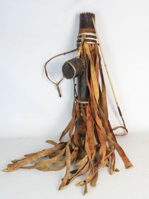 a broom with a handle and some brown strips on it