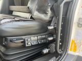 an image of a car with a bunch of luggage in the back