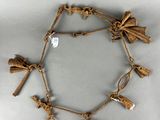 a close up of a bracelet with a bunch of charms on it