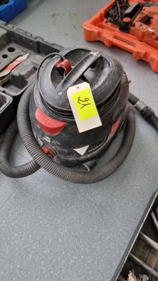 an image of a duster and other tools on a workbench