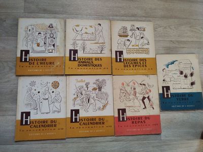 six books of french children ' s books are lined up on a table